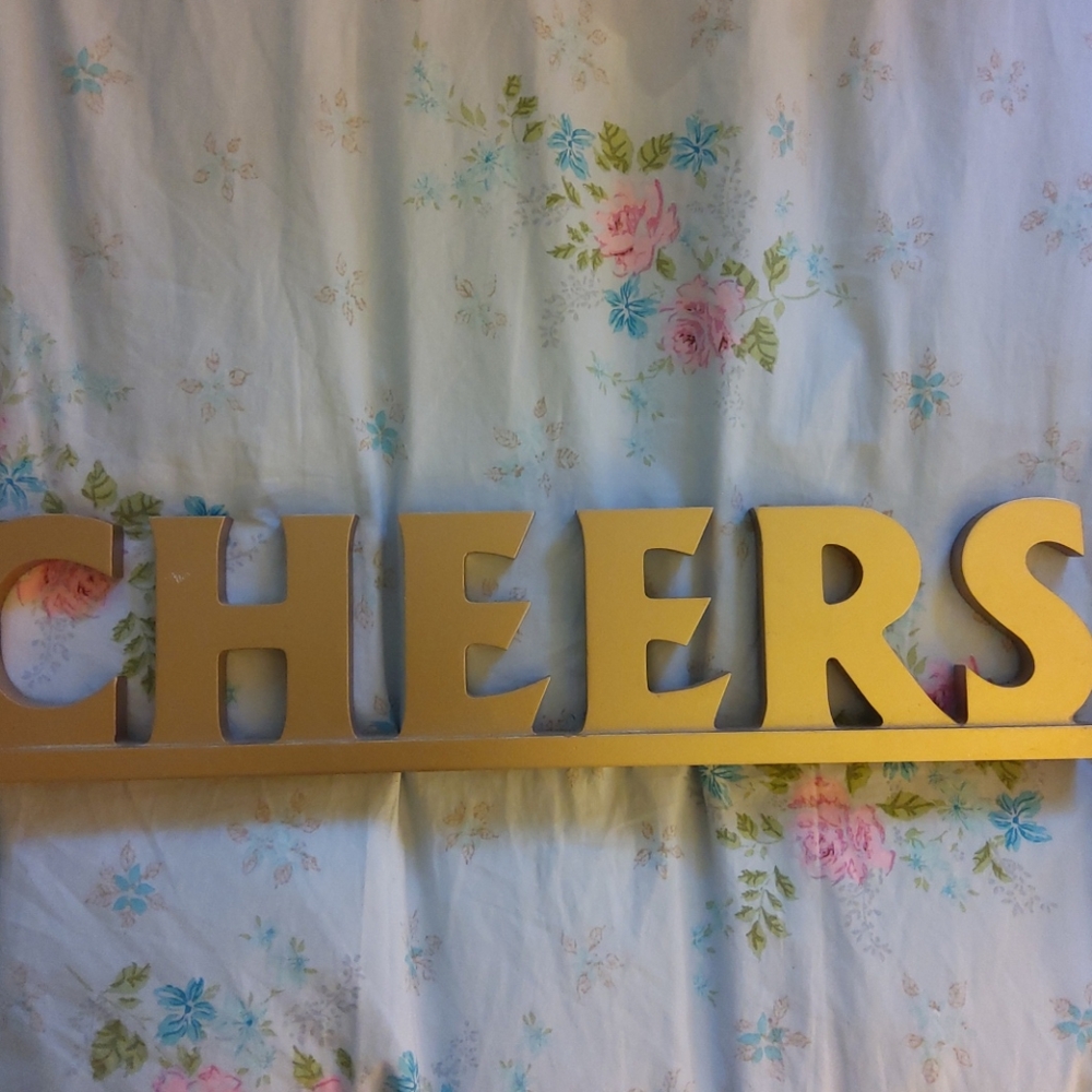 Wooden cheers sign